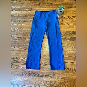 Women’s Blue Tuff Athletics Flared Leggings. Size: Large.